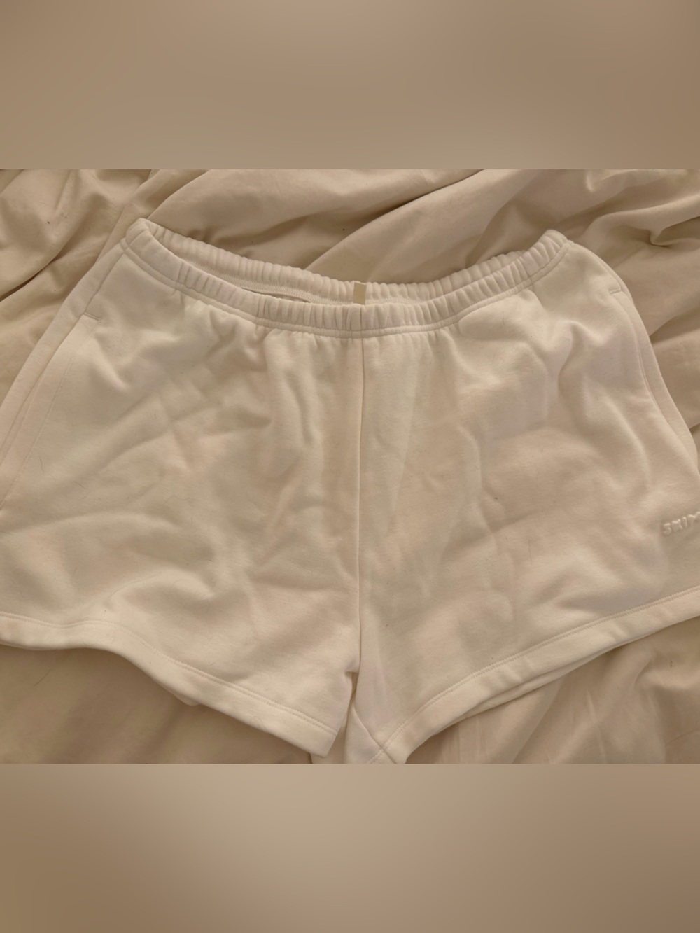 SKIMS Cream Lounge Shorts